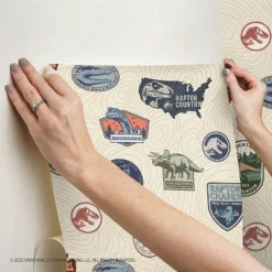 Jurassic World Badges Peel & Stick Wallpaper Beige - RoomMates 8 Jurassic World Badges Peel & Stick Wallpaper Beige - RoomMates -Kids Home Store GUEST e405b9a5 b58f 40e0 b7d9 727072ebf4cc